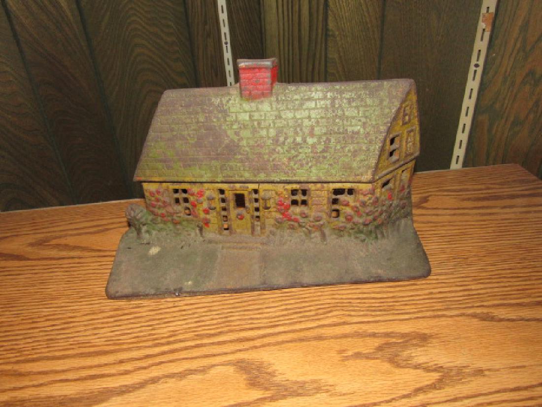 Antique Cast Iron House Doorstop. (1 of 3)