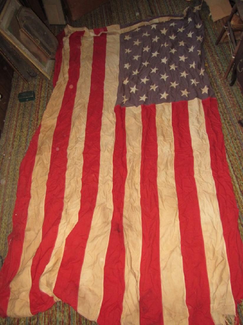 Vintage American Flag: Approx. 58" x 105". Has some damage on end.