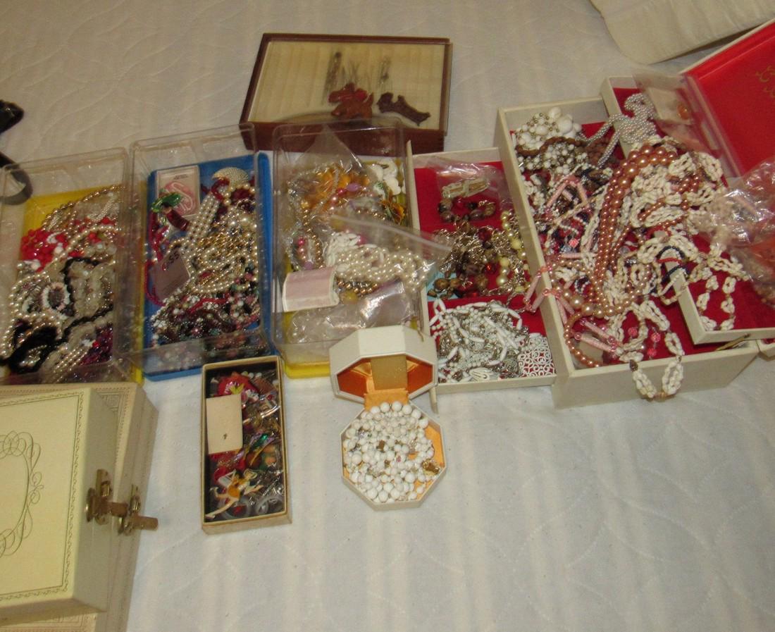 Large Lot of Costume Jewelry: Getting all jewelry and 2 jewelry boxes that are empty