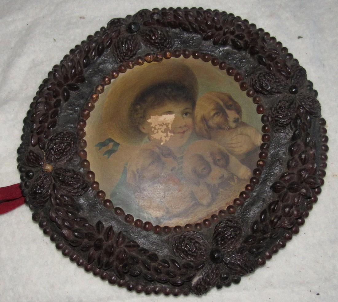 Tramp Art Picture Frame: Approx. 10 1/2" in diameter. Has warping to it