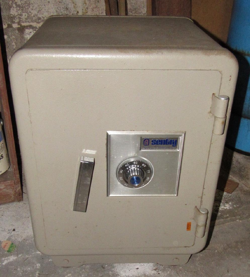 Sentry Safe: Approx .17" x 17" x 23 1/2" high. No combination