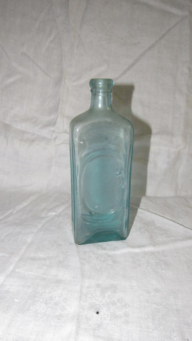 Early Glass Bottle: Approx. 1 3/4" x 3" x 8 1/2" tall