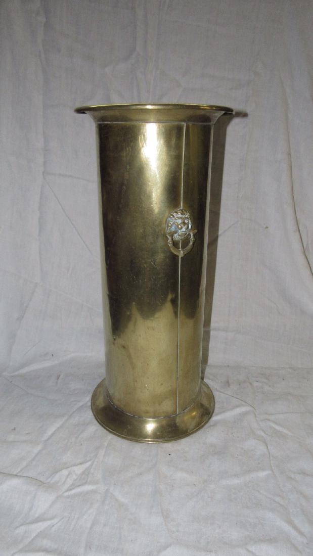 Brass Umbrella Stand: Approx. 9 1/2" in diameter and 21 1/2" tall. Has some dings in it