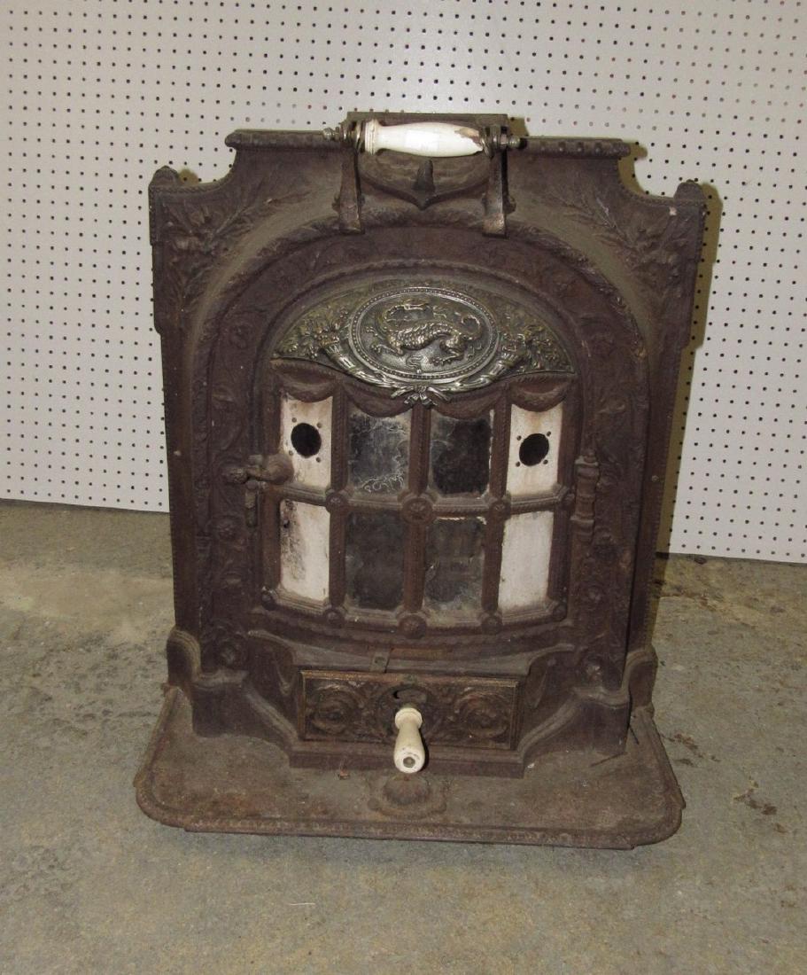 A Salamandre Cast Iron Stove Chaboche: Approx. 17" deep , 24 1/2" wide, and 30" tall.