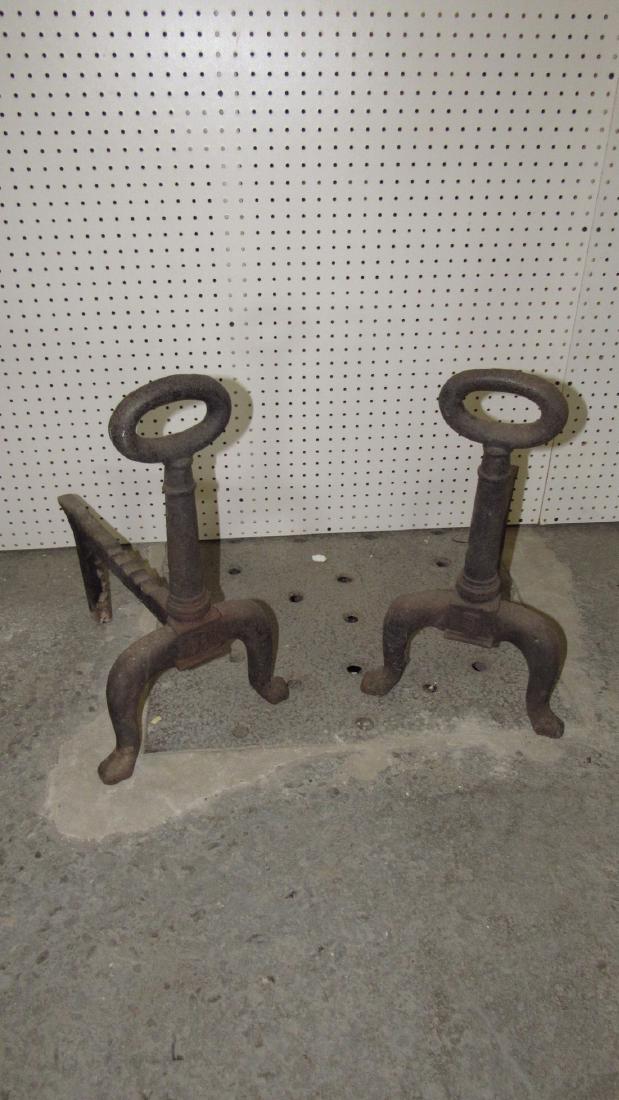 Heavy Antique Cast Iron Andirons: Approx. 12 1/2" x 18 1/2" x 22" tall.