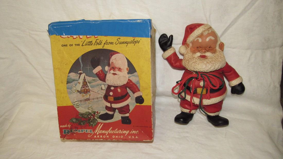 Rempel Rubber Santa Claus Squeaky Toy: Approx. 10 1/2" tall. It does not squeak and is hardened