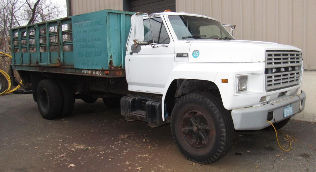 1984 Ford F600 Diesel Rack Body Truck: Rack Body is approx. 17' long. Lift Gate does work. Owner says it runs good and will need batteries soon.