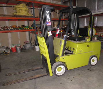 Clark C50055 LPG Forklift Fork Truck: Owners says it runs good. Leaks a little antifreeze. Pick up for this is not on Scheduled day for other items. We will be using this to load out. Please look at Auction Description for pick up day on