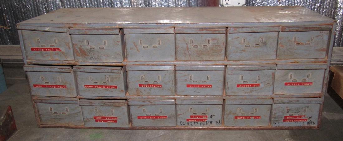 18 Drawer Parts Cabinet: Approx. 12" x 34" x 13" tall.