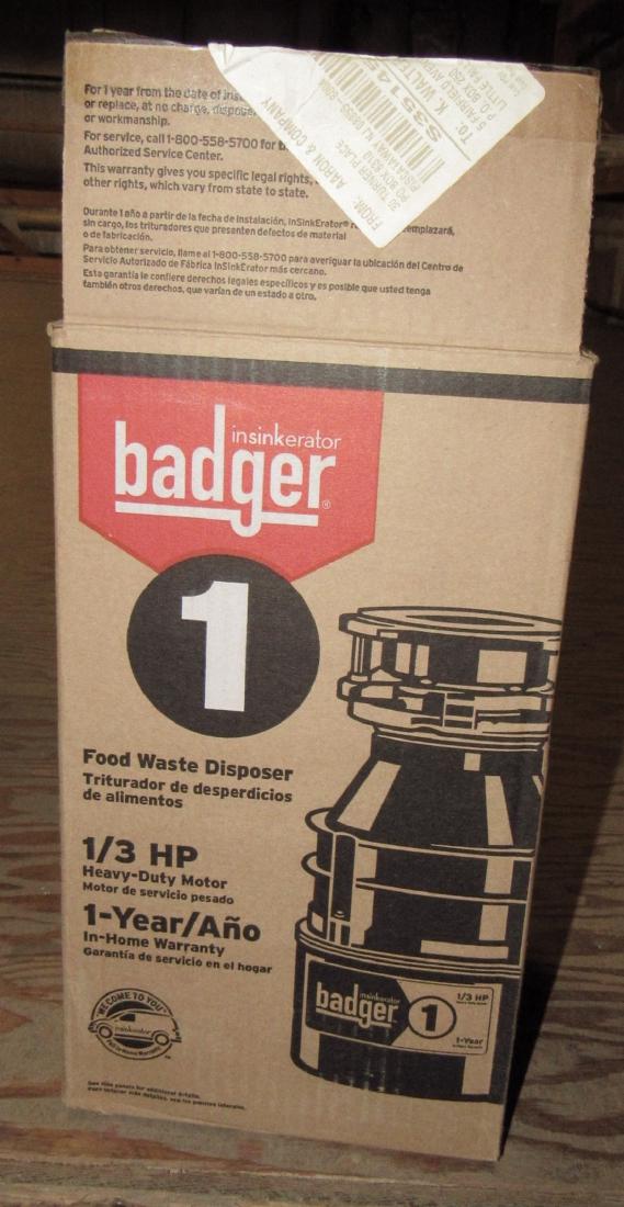 Badger 1/3 hp Food Waste Disposal: New in box. BUYER MUST CARRY THIS DOWN FROM SECOND FLOOR .