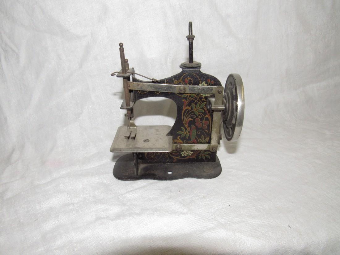 Childs Sewing Machine: Approx. 2 1/4" x 5" long. No. 143889