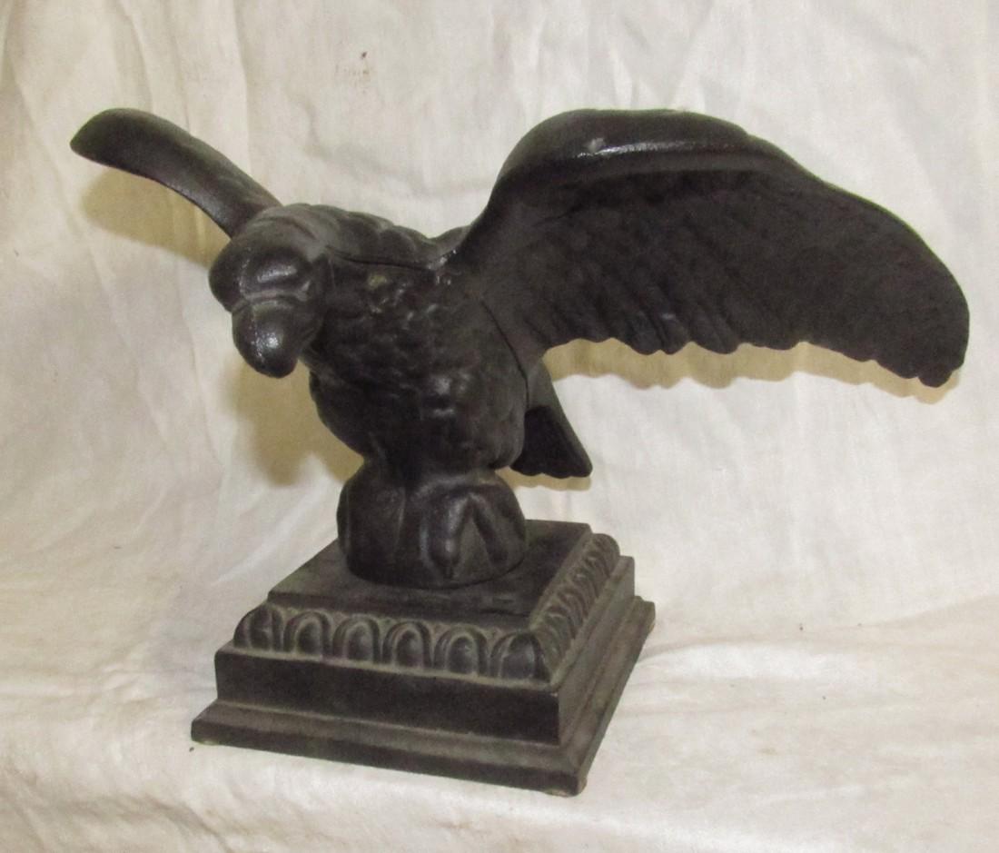 Cast Iron Eagle: This is approx. 14 1/2" wing to wing and 9 1/2" tall. Heavy!