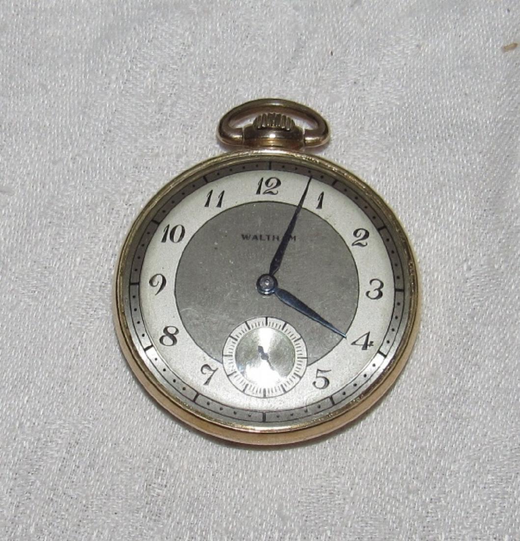 Colonial Waltham 10K Gold Filled Pocket Watch: Approx. 1 7/16" in diameter. No in working order.