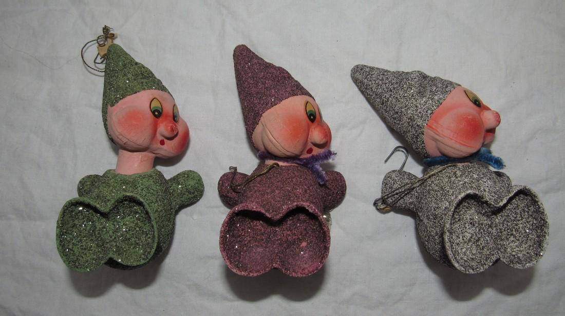 3 1957 Kurt Adler Christmas Tree Ornaments: Approx. 5" long. One has lantern, one has tag, and one has a loose head.