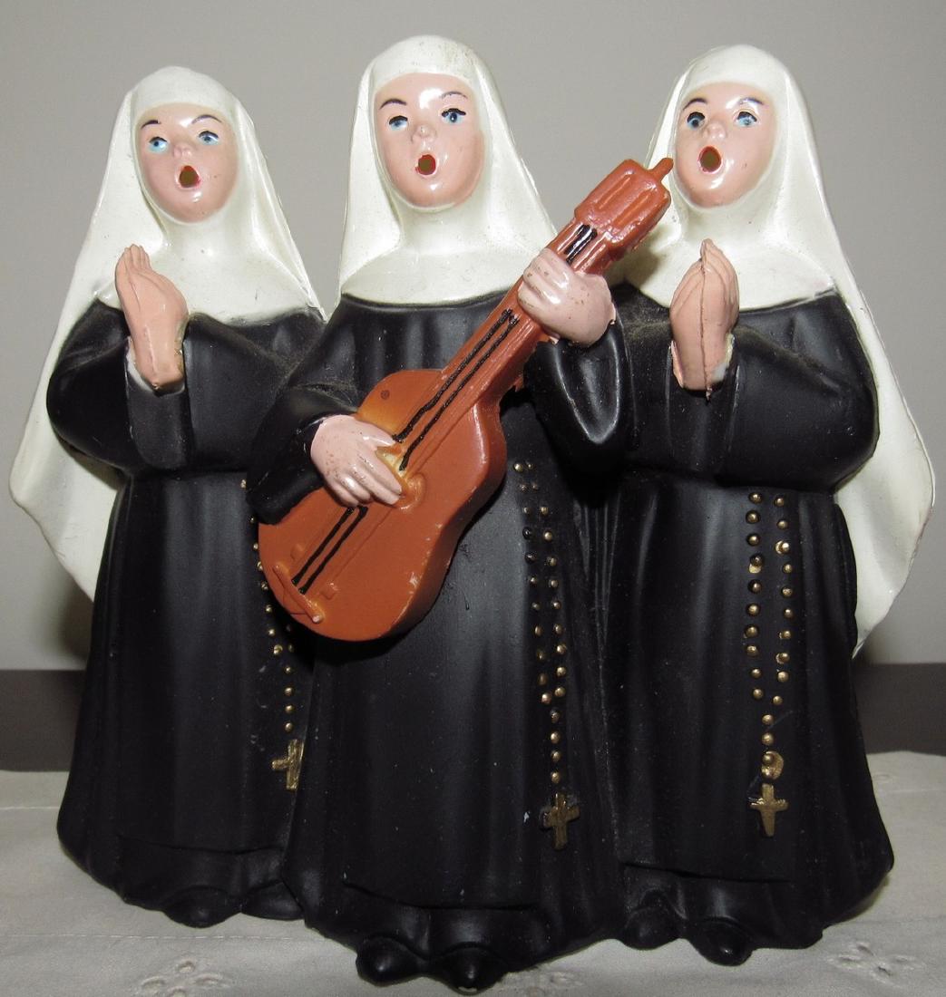 Vintage Nun Music Box: Approx. 6" tall. Made of plastic.