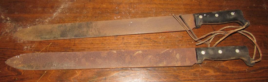 2 Machetes: Blades have light rust on them