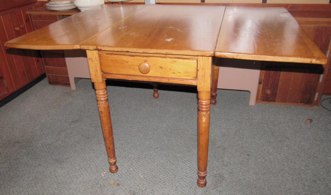 Drop Leaf One Drawer Table: Approx. 52 1/4" x 39 3/4" x 29 1/2" tall. Has some scratches and stains on top