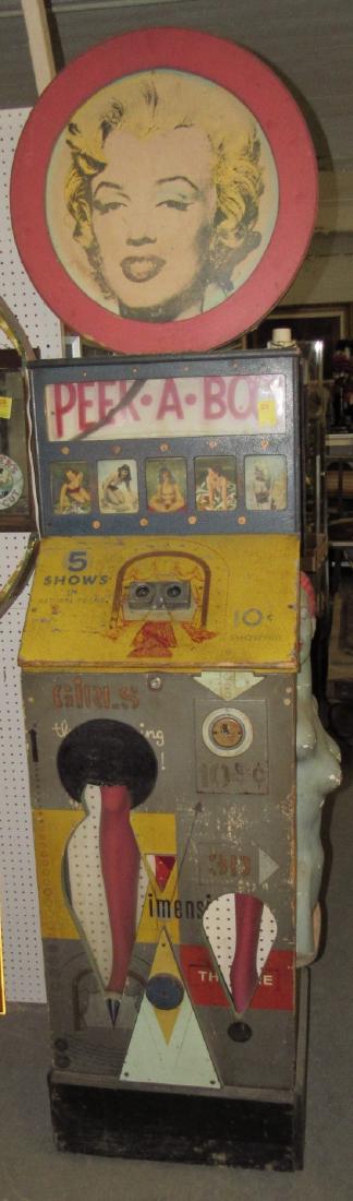 Peek A Boob Arcade Machine Venus Works: Approx. 20" x 23" x 98" tall. If you put a dime in, it does goe thru pictures. Every once in a while, there is a piece of tape that comes thru the pics. A couple of the lights work on it. Plaster stat