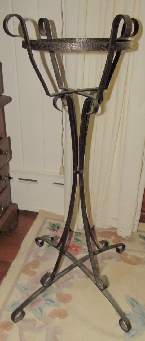 Wrought Iron Plant Stand: Approx. 36 1/2" tall and 11" inside diameter