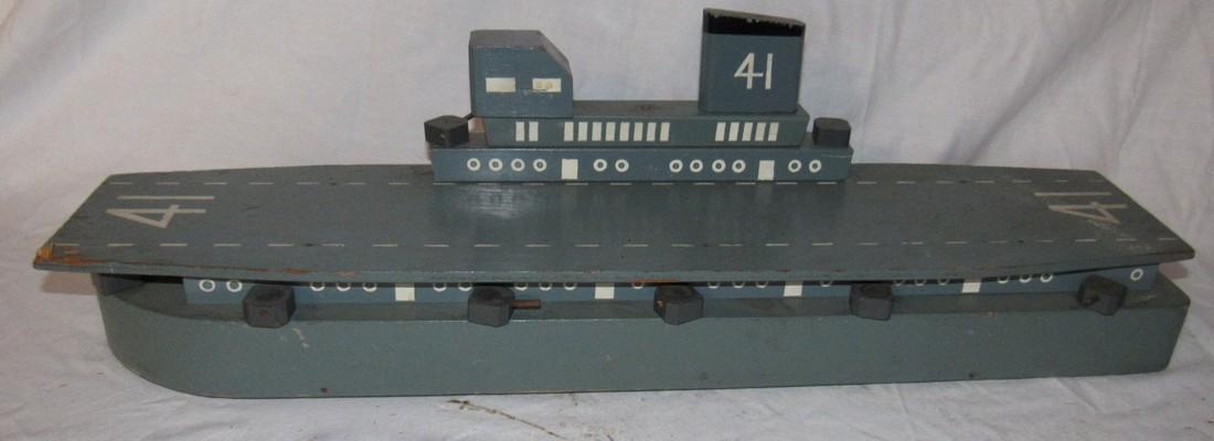 Wooden Air Craft Carrier Toy: Approx. 6" x 24" x 6" tall. Has a small piece broken on one end.