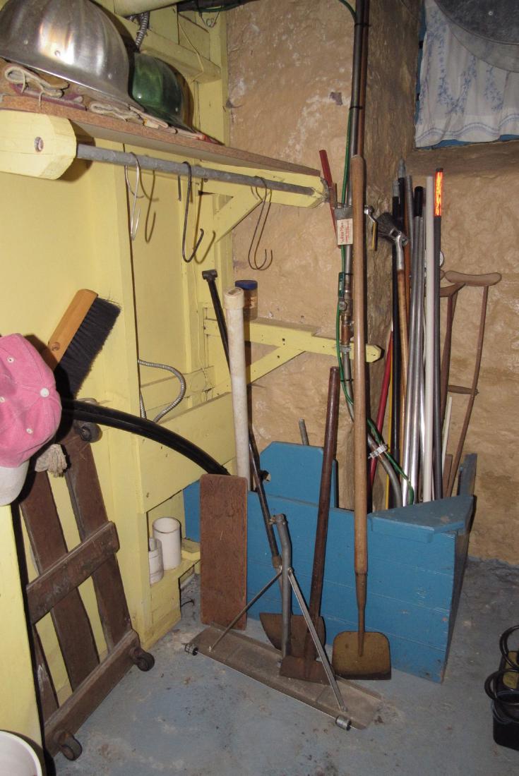 Partial Wall Contents Ice Melt Choppers Brooms Hard (1 of 5)