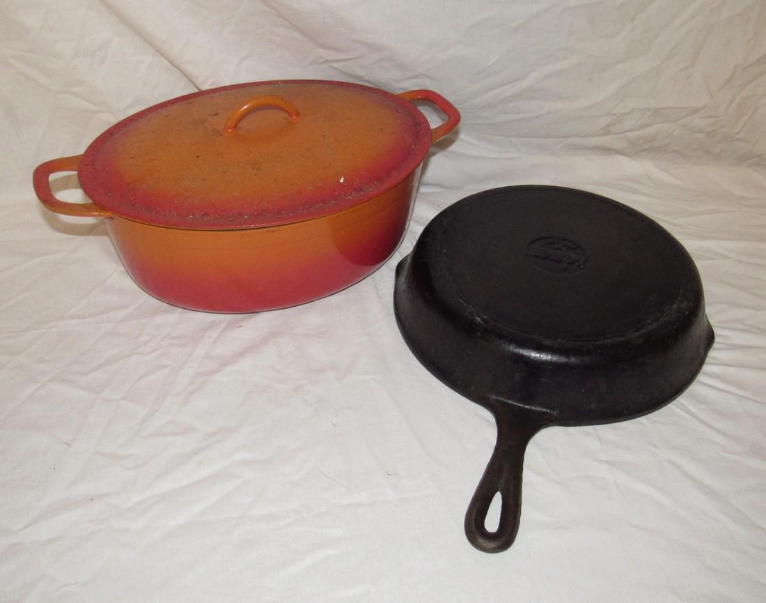 Descoware Enameled Dutch Oven & Lodge Cast Iron Skillet: Dutch oven is approx. 8 1/2" x 14" x 4 1/2" tall.