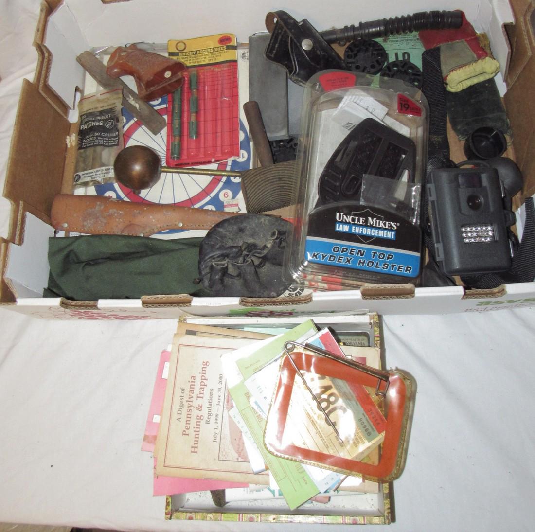 Pistol Grip Holsters Game Camera Muzzle Loader Sabots: Gun supplies, box of vintage hunting licenses and misc
