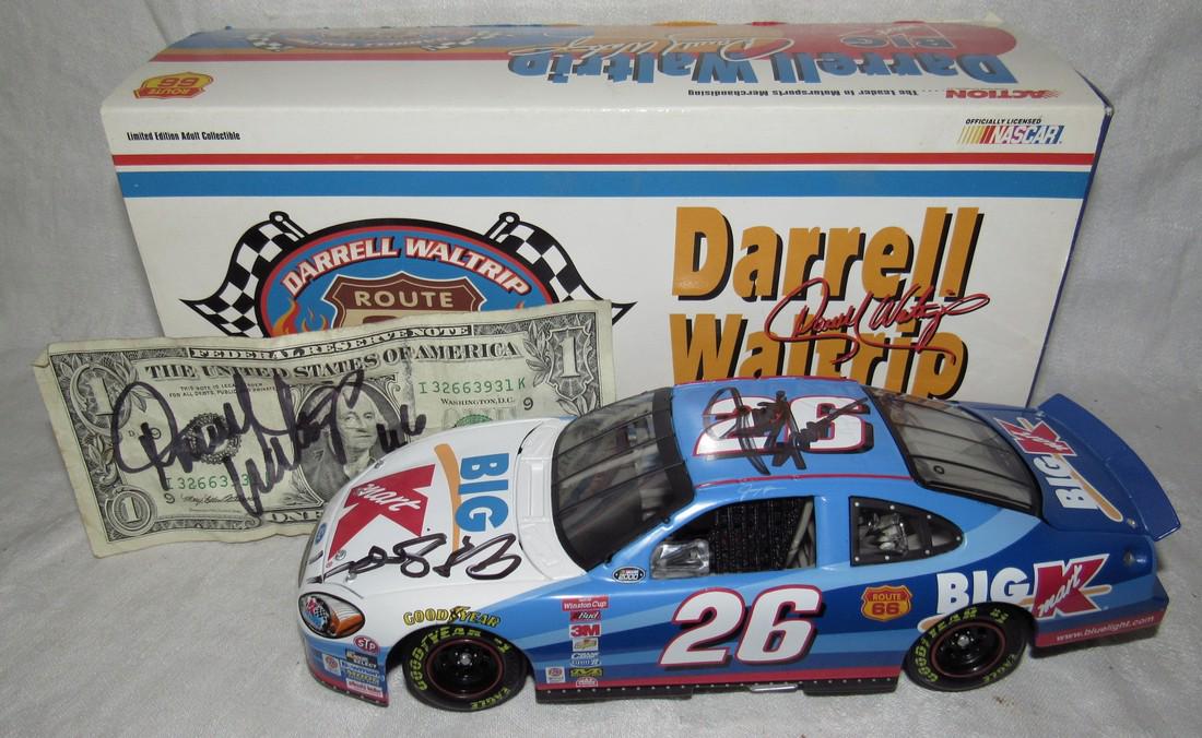 Darrell Waltrip #26 Big Kmart Autographed Diecast Car: 1:26 Scale Action Racing Car signed and dollar bill