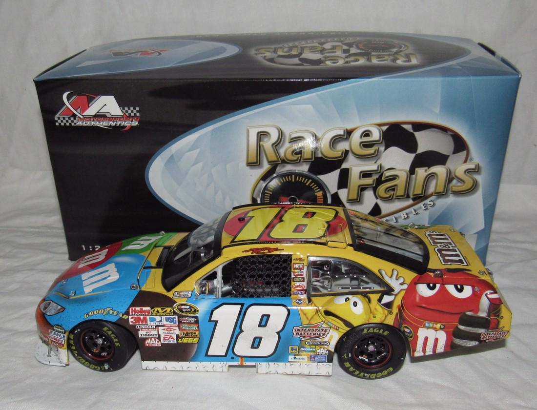 Action Kyle Busch #18 M&M's Autographed Diecast Car (1 of 2)