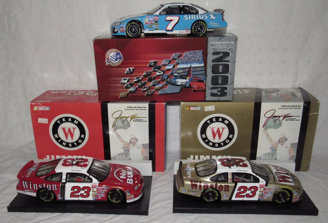 3 Jimmy Spencer Winston Select Autographed Diecast Cars: 1:24 Scale Action Diecast Cars. Box Sleeve on bottom left car is slight rippled from moisture