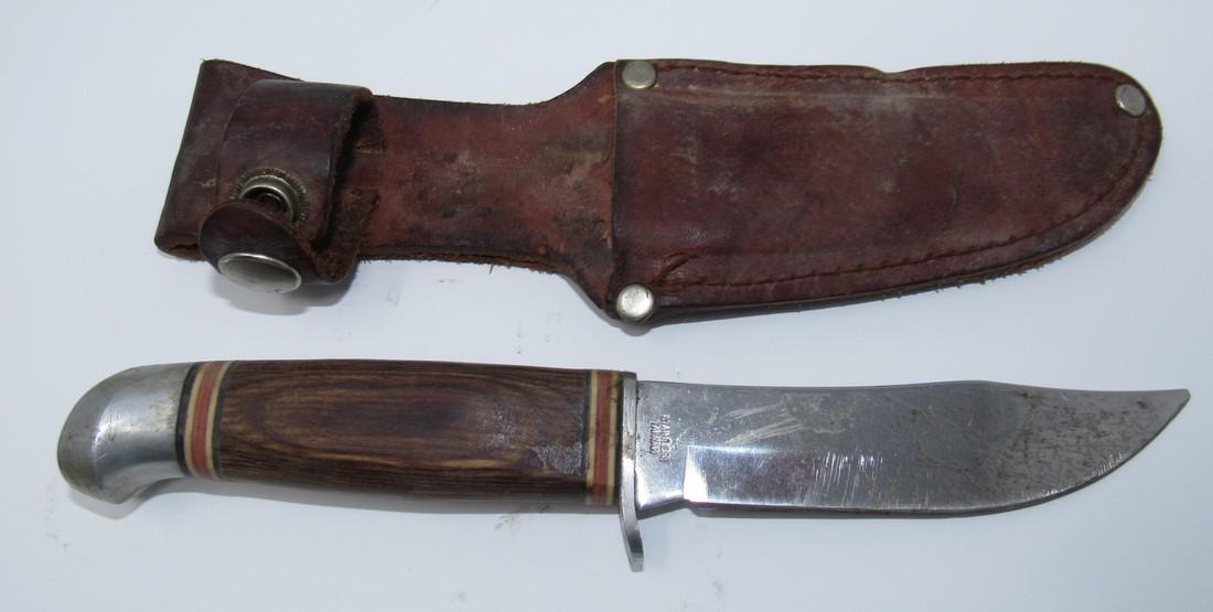 Sharp Hunting Knife with Sheath: Blade is approx. 8 1/2" total length.