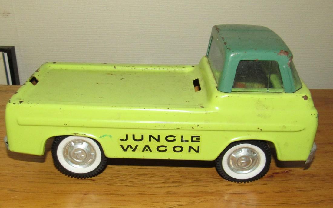 Nylint Jungle Wagon: Approx. 11" long. Has slight wobble to it. Something is bent on bottom