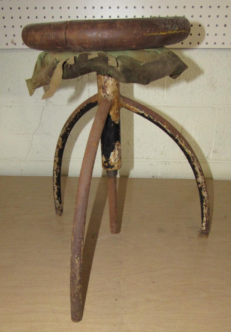 Antique Industrial Adjustable Stool: Approx. 11 1/2" in diameter and 19 1/2" tall. Seat is cracked
