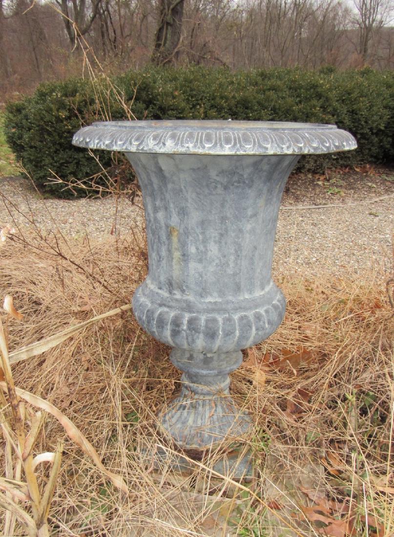 Cast Iron Urn: Approx 22" in diameter and 31" tall