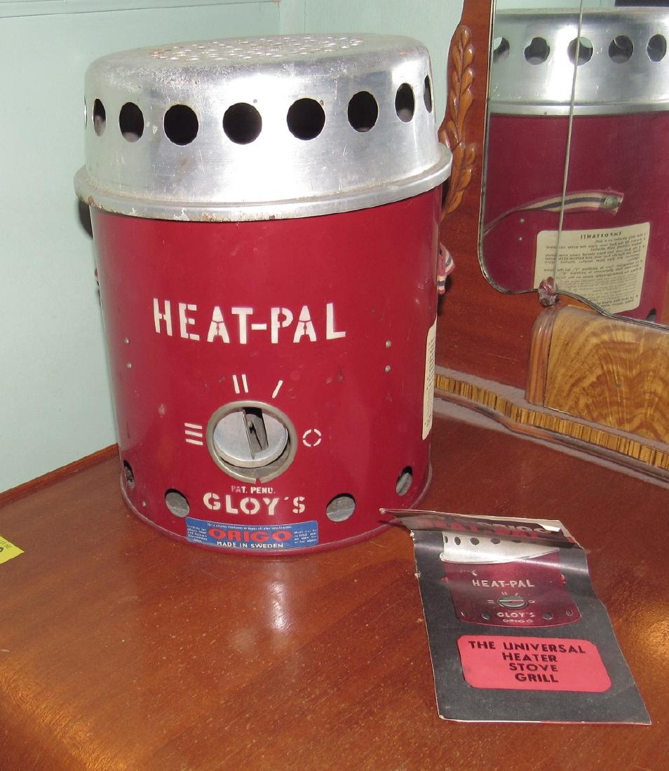 Gloy's Origo Heat Pal Stove: Approx 9" in diameter and 11 1/2" tall