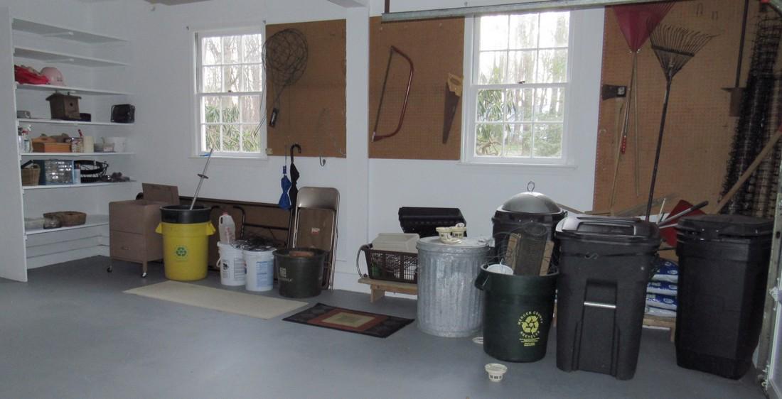 Partial Garage Wall Contents Folding Table Garbage Cans (1 of 9)