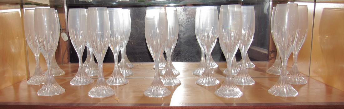 12 Baccarat Wine Glasses: Approx 8 3/4" tall. We do not visually inspect every piece for damage. Sold as is as pictured