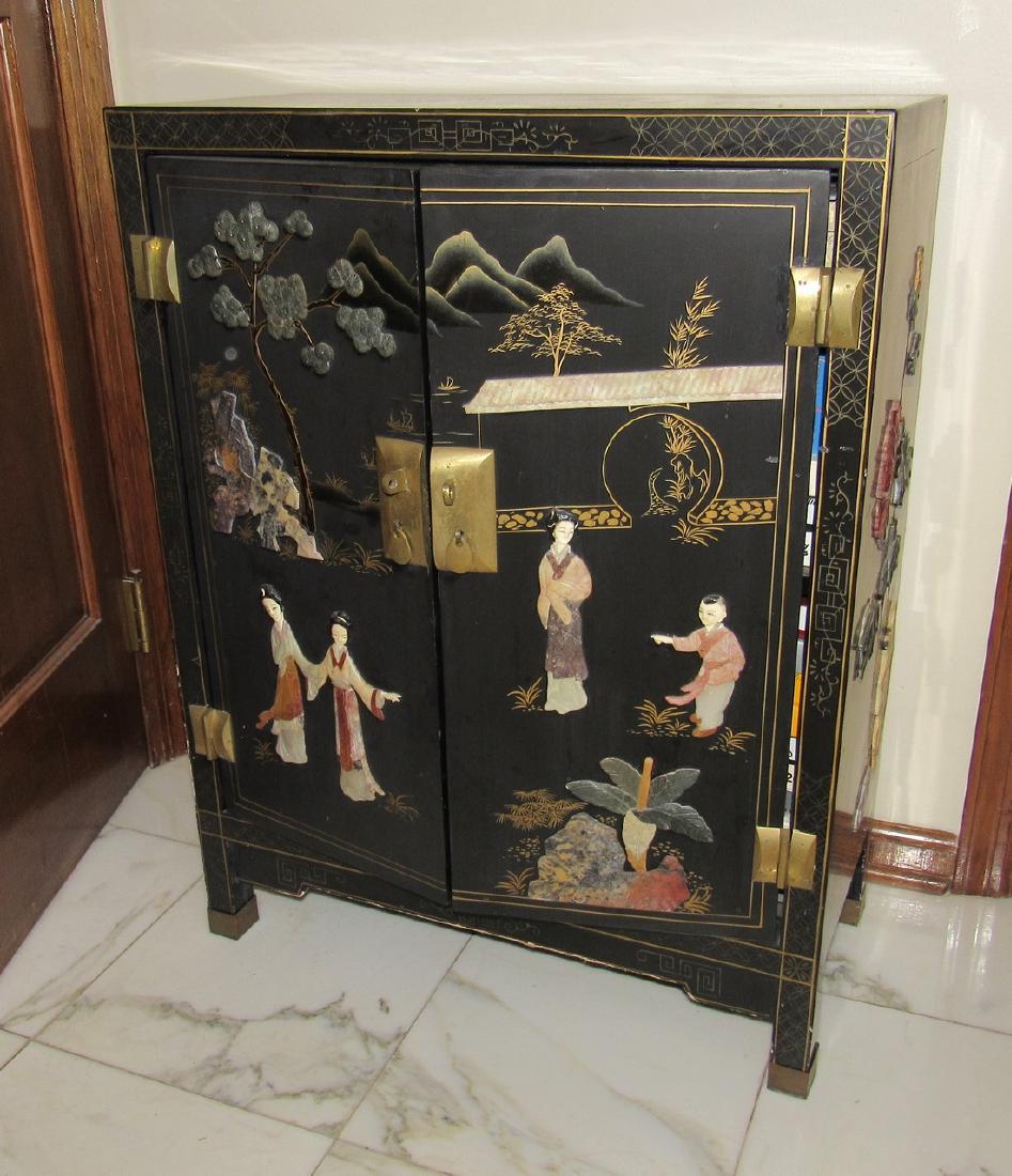 Oriental Black Lacquer 2 Door Cabinet: Approx 11 "x 23" x 30" tall. DOES NOT INCLUDE CONTENTS