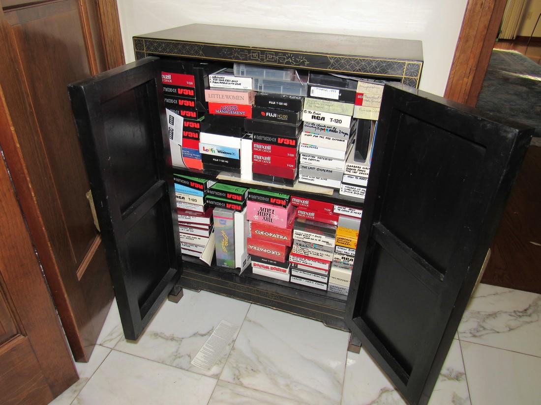 Large lot of VHS Tapes Adult ?: Some maybe adult tapes. Getting all pictured in cabinet