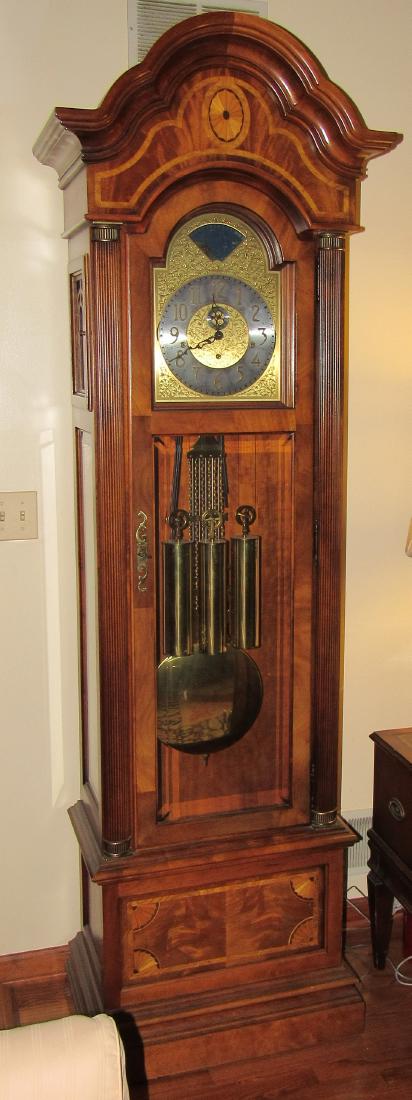 Howard Miller Grandfather Clock: Approx 14" x 23 1/2" x 86" tall. Sold in untested condition