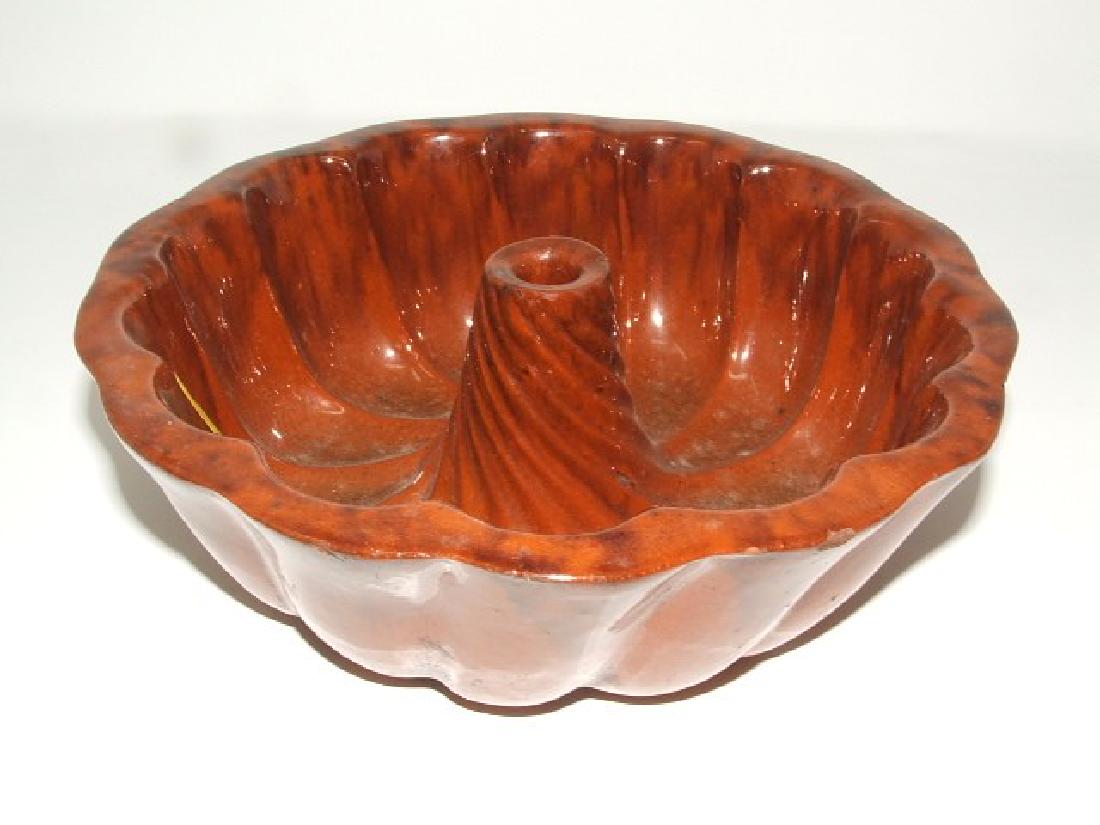 Redware Bundt Mold & Crock: Mold is approx. 8 1/2" diameter; crock is approx. 6" high; both have rim chips