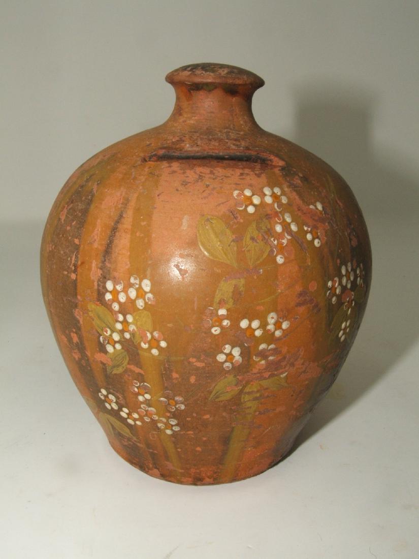 Redware Pottery Hand Painted Bank: Approxd 3 1/2" in diameter and 4 1/2" tall. Has chip on very top.