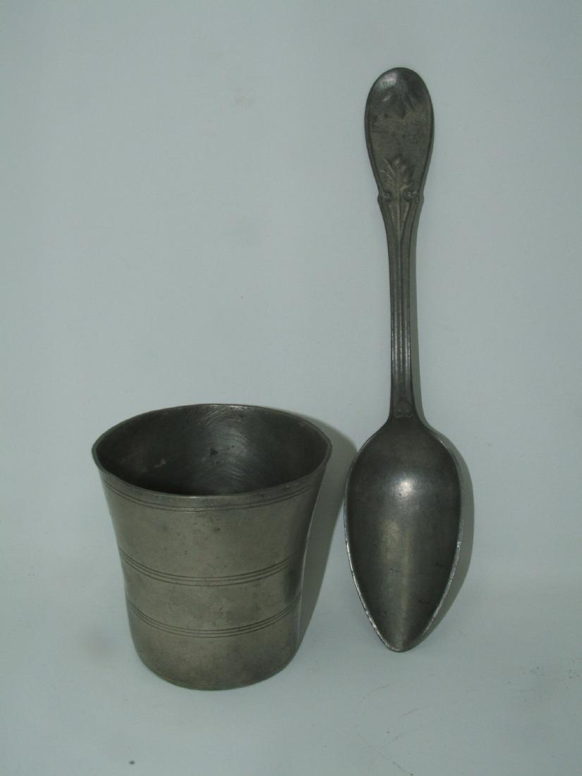 Ashibal Griswold Pewter Beaker & Pewter Spoon: Beaker is approx 3" in diameter and 3" tall. Does has some minor bending around rim.