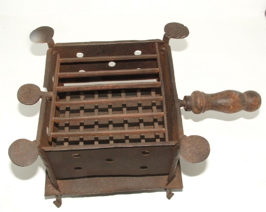 Antique Wrought Iron Camp Stove: Approx 8 1/2" x 8 1/4" x 7 1/2" tall. Wooden handle has cracking