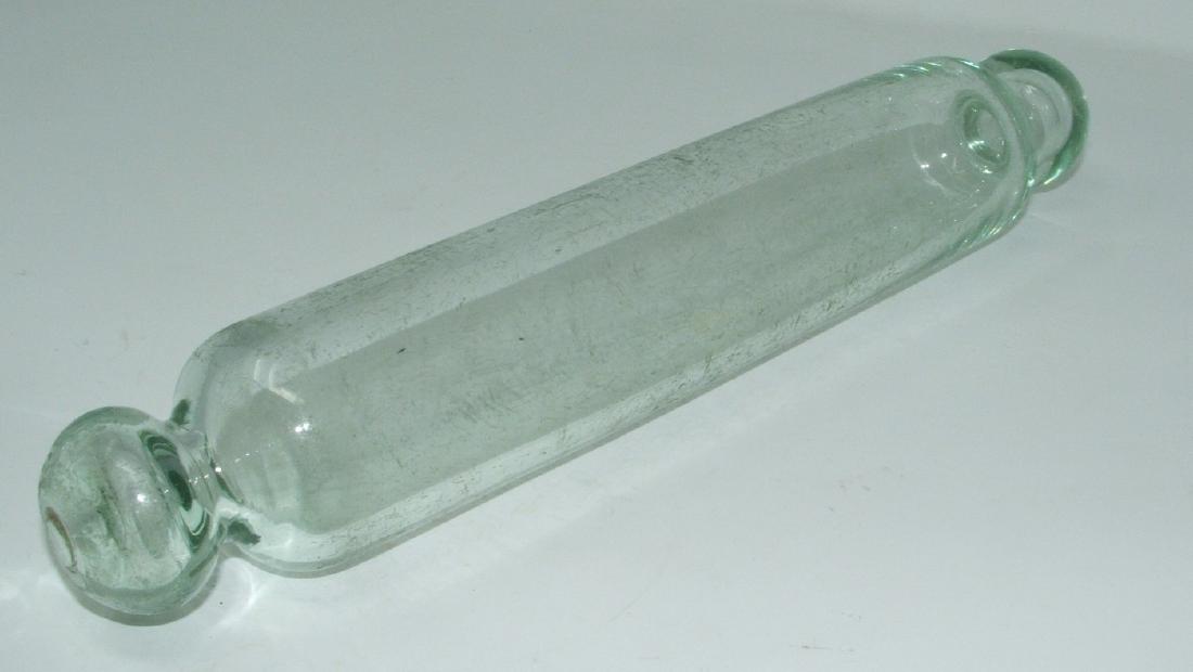 Antique Glass Rolling Pin: Approx 2" in diameter and 12" long . No chips or cracks, but does have a lot of scratches.