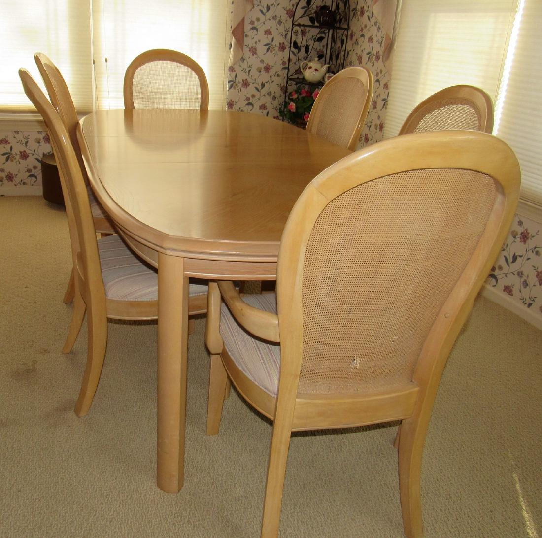 Dining Room Table and 6 Chairs: Table is approx 42" x 81" ( with one leaf in it) . Also comes with extra 18" leaf. Chairs all need a light cleaning and one arm chair has damage.