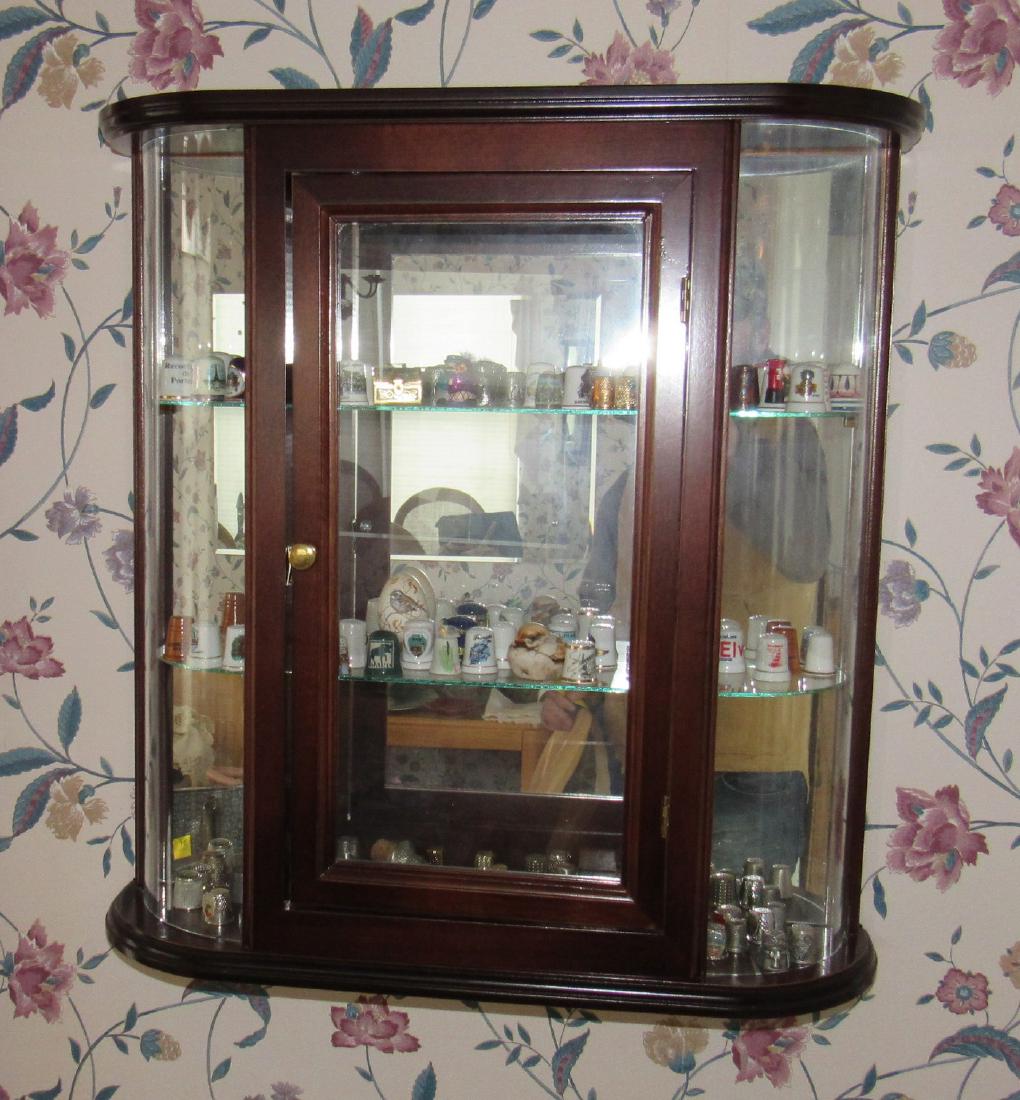 Display Shelf with Approx 99 Collector Thimbles: Approx. 99 thimbles . Display shelf is approx 21" x 21 1/2". Includes everything in it.
