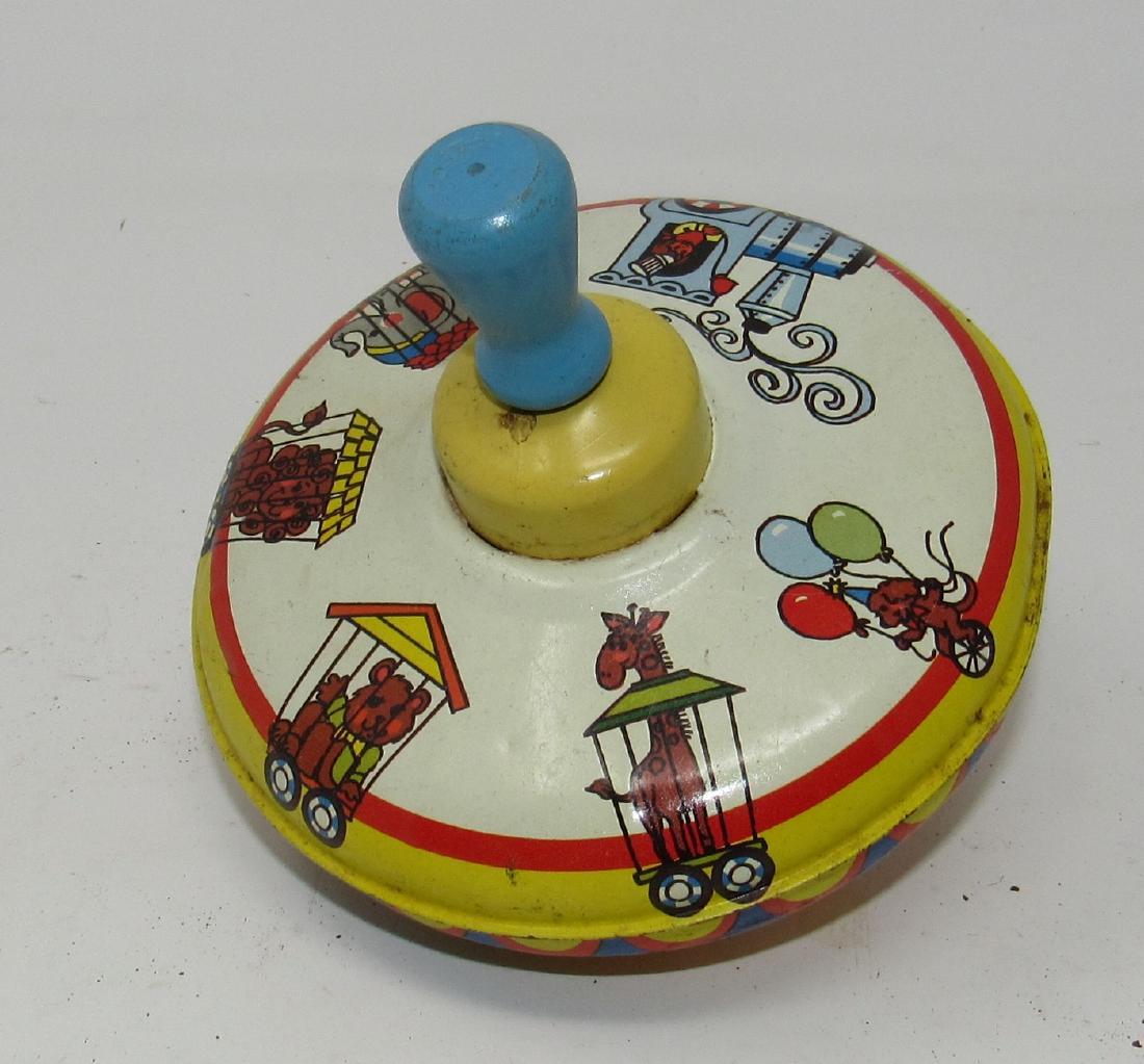 Ohio Art Top: Approx 5" in diameter. Has a couple tiny dings