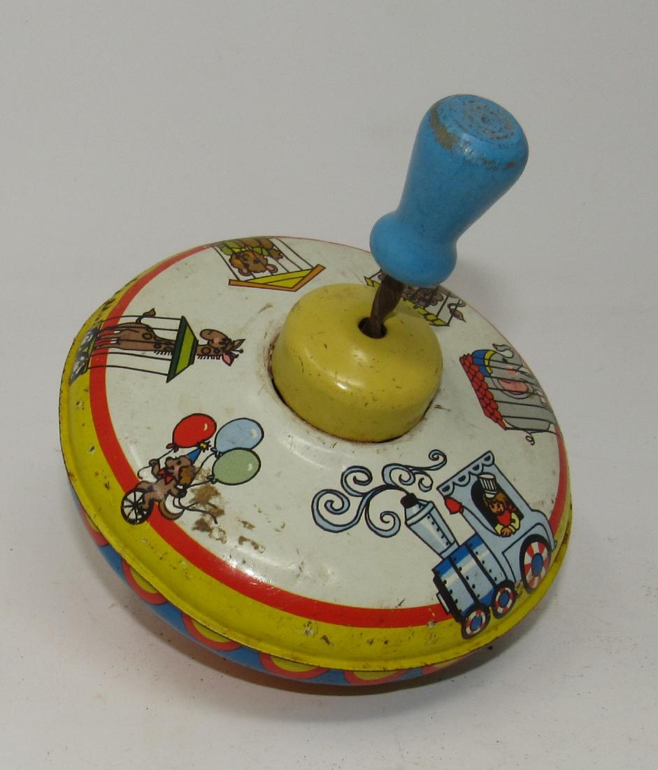 Ohio Art Tin Top: Approx 5" in diameter. Has a couple tiny dings