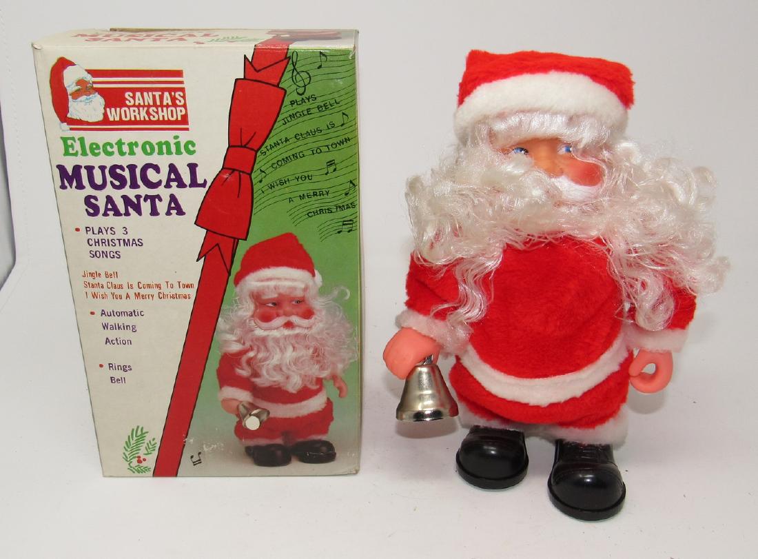 Electronic Musical Santa Santas Workshop: Approx 9 1/4" tall. Sold in untested condition